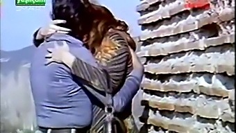 A Couple'S Romantic Kiss In A Turkish Setting